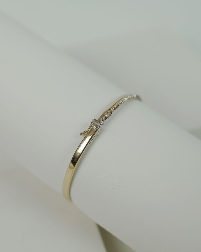 Diamanset Diamond Pavé Bangle in yellow gold, a slim rounded bangle with a pavé-set diamond line