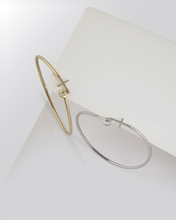 Diamanset Diamond Twin Bangle Set, one yellow gold and one platinum bangle with diamond stations