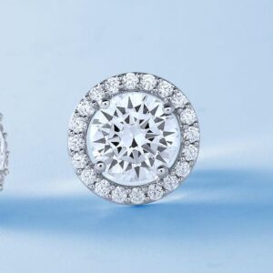 Diamanset Halo Solitaire Studs, a round centre diamond framed by a bead-set halo, second earring visible behind