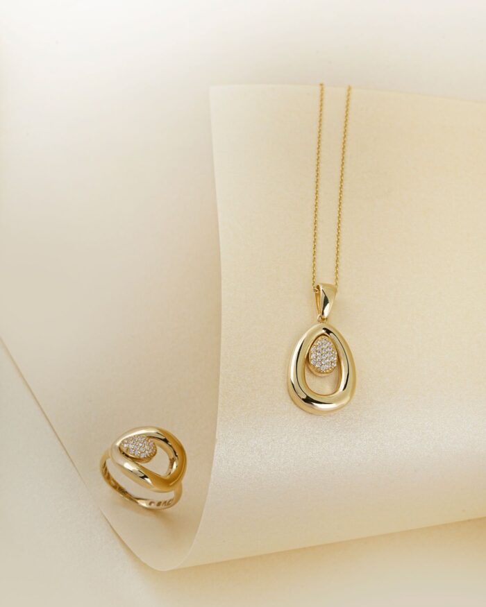 Diamanset Pavé Teardrop Necklace in yellow gold, an open teardrop pendant with a pavé-set centre