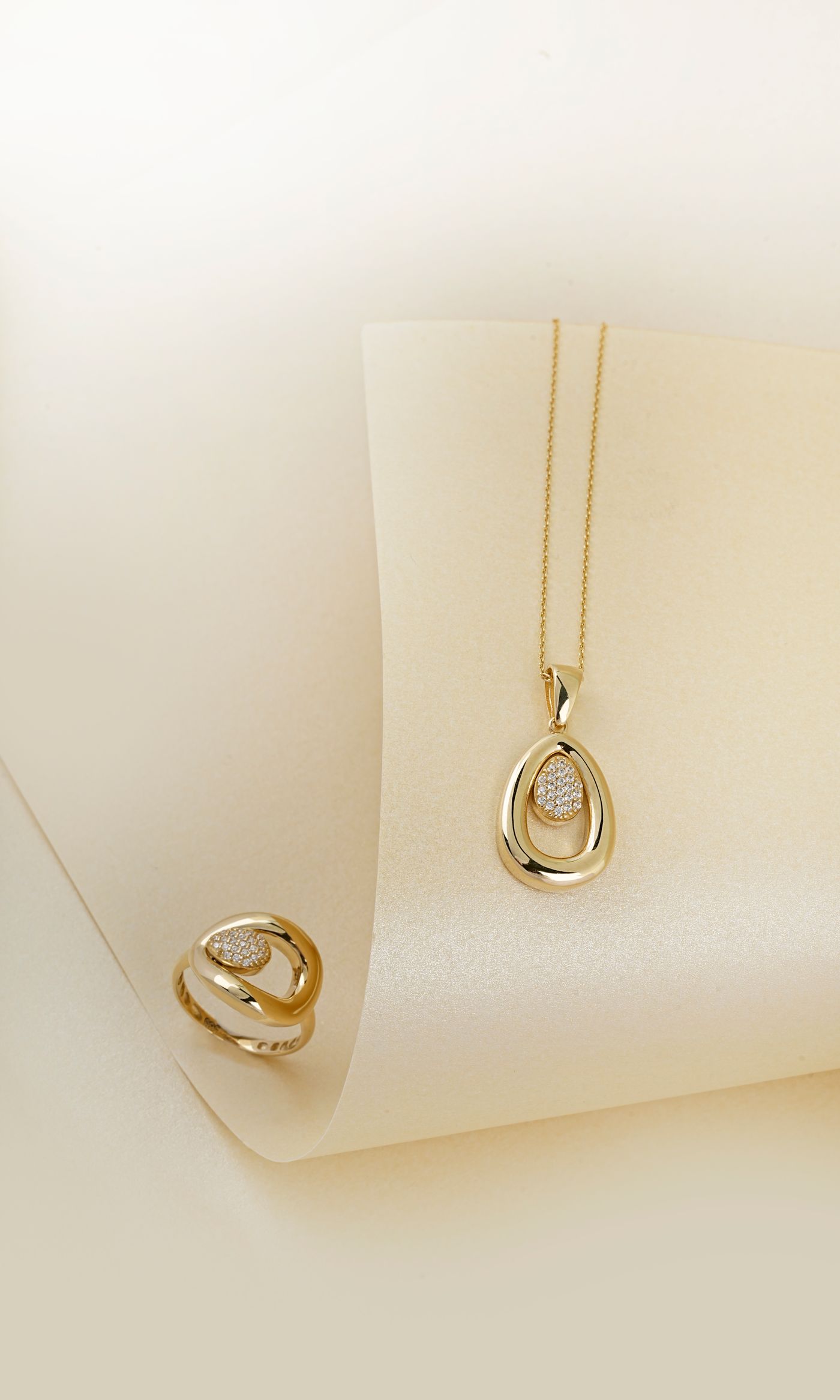 Diamanset Pavé Teardrop Necklace in yellow gold, an open teardrop pendant with a pavé-set centre