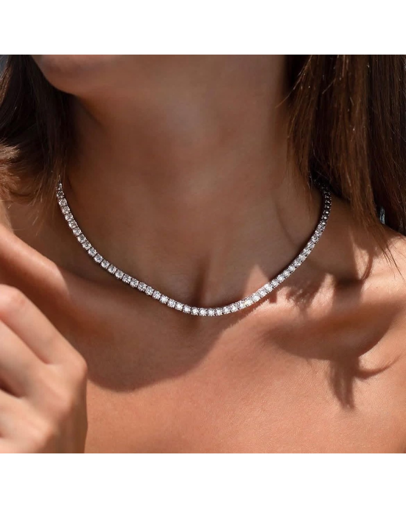 Diamanset Men's Moissanite Tennis Chain, silver tennis necklace with round 3 mm moissanite stones worn by a man
