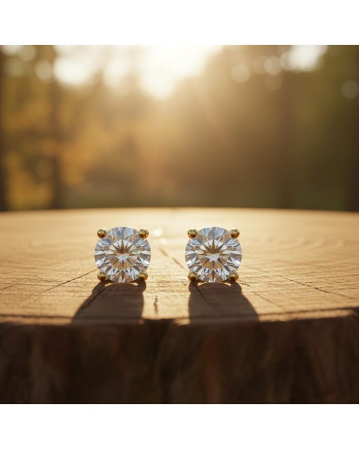 Diamanset Moissanite Solitaire Studs, gold plated prong earrings with a round 1 ct moissanite each